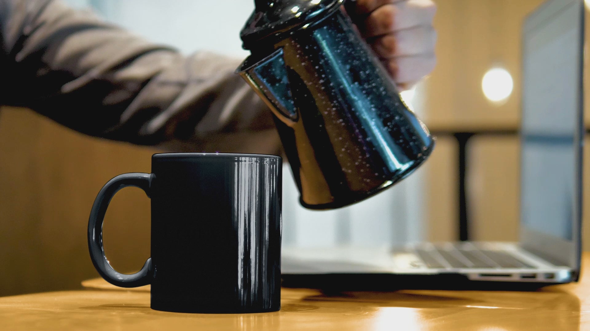 Video showing a hot beverage being poured into a magic mug which changes colour from black to white, whilst revealing a subliminal motivational message "I Can & I Will"